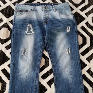 Slim distressed and repaired jeans